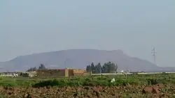 The "Green Mountain", the only visible hill, east of the region