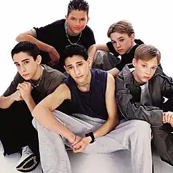 Dream Street on stage standing in line performing "This Time".