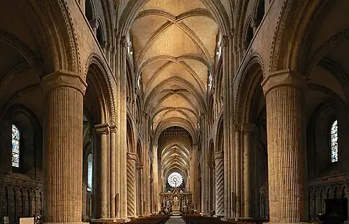 The transition from Romanesque to Gothic styles is visible at the Durham Cathedral in England, (1093-1104). Early Gothic rib vaults are combined with round arches and other Romanesque features.