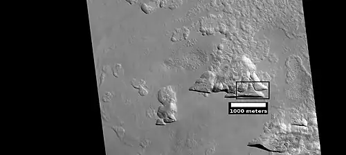 Possible variation of scalloped terrain in depressions with straight southern walls, as seen by HiRISE under HiWish program. Box indicates part enlarged in images below. Image located in Diacria quadrangle in Milankovic crater.