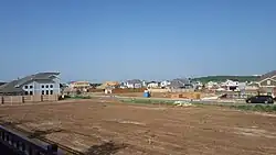 New home construction at Easton Park in Austin, Texas, United States. Taken 11 July 2016 from the northeast corner of William Cannon Drive and McKinney Falls Parkway.