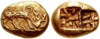 Electrum coin from Ephesus, 620–600 BC. Obv.: Stag grazing right, ΦΑΝΕΩΣ (retrograde). Rev.: Two incuse punches, each with raised intersecting lines.