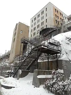 du Faubourg elevator and stairs.