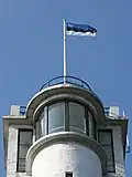 National flag on top of Suur Munamägi (the highest point in Estonia, at 318 metres (1,043 ft) above sea level; photo 2007)