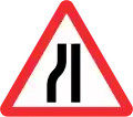 Road narrows on left