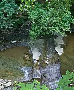 Water falling over the shale creek bed in Euclid Creek Reservation