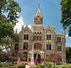 The current Fayette County Courthouse in La Grange was finished in 1891. The Romanesque Revival-style building uses four types of native Texas stone to detail the exterior.