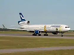 Finnair McDonnell Douglas MD-11 decorated with Moomin characters serving the Japanese route
