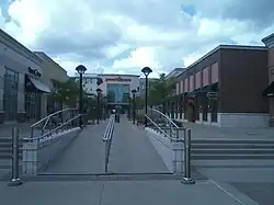 An outdoor concourse of a shopping mall.