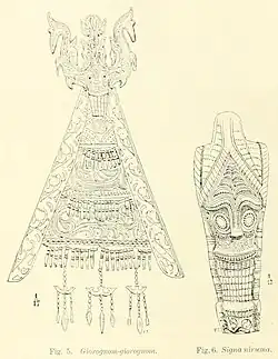 Giorognom-giorognom (carving at the top of a Toba house) and signa (figurehead on either side of a Toba house)