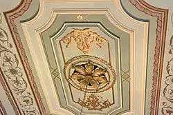 A detail of the painted ceiling in a Government House salon