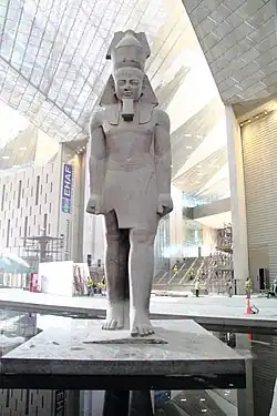 Large ancient Egyptian statue of Ramesses II in the museum's entrance hall