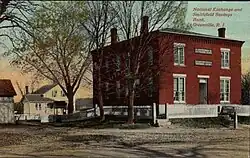 The "new" brick Smithfield Exchange Bank, built in 1856, adjacent to the original wooden structure. Shown at the turn of the twentieth century.