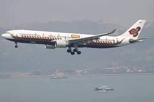 Airbus A330-322 (HS-TEK) in the Royal Barge Narai Song Suban Livery.