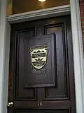 Front door with Boston Bar Association emblem