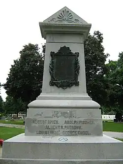 Haymarket Martyrs' Monument, rear, with text of the pardon on bronze tablet, and names of the "martyrs".