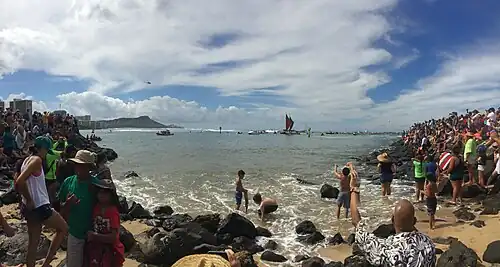 Thousands line the channel to welcome Hōkūle'a home from her worldwide voyage in June 2018