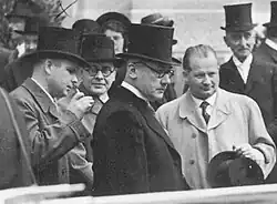 A photograph of four prominent Liechtenstein politicians in 1938. Standing from the left are Alois Vogt, Otto Schaedler, Josef Hoop and Ludwig Marxer.
