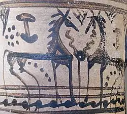 Two horses, facing each other, drawn in black slip on a pot: the decoration is crude by comparison with classical Greek pottery
