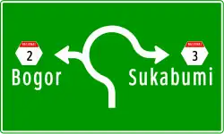 Roundabout directional sign in Indonesia.