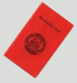 A small red cardstock booklet bearing the text, "Membership Card," and an IWW globe insignia.