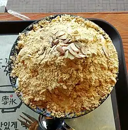 Bingsu topped with kong-gomul (soybean powder)