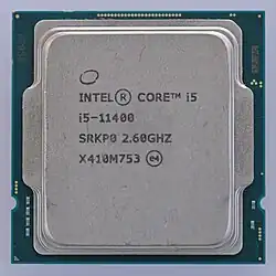 An silver, rectangular Intel Core i5 11400 microprocessor, as viewed from the top.