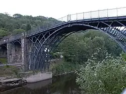 The Iron Bridge, a two-hinged arch, the first cast-iron bridge and the oldest still standing on its original site