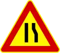 Road narrows on right