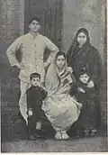 Jatin in 1912. Standing behind Didi Vinodebala (sitting) with his wife Indubala, elder son Tejen (left) and daughter Ashalata (right)