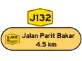 A state route with a Yellow background, black letters for road names and also black letters for kilometers.
