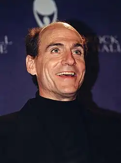 A head shot of singer James Taylor.