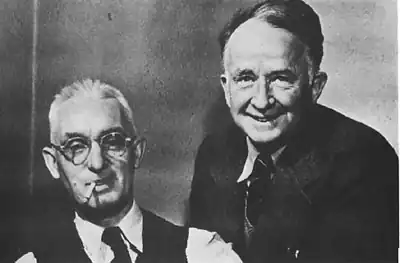 Black-and-white photo of two elderly men