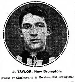 Grainy black and white photograph of a dark-haired young man in a striped football shirt