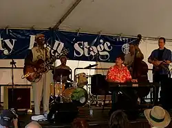 Bassett and his band performing at the Great Lakes Folk Festival, 2006