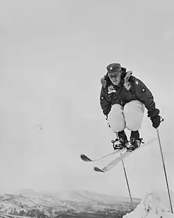 Jon St. Andre performing a ski jump at Black Rapids Training Center, Alaska, Nov. 24, 1959.