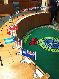 Flag of the Pitcairn Islands (eighth from the back) in Court 3 of the Judicial Committee of the Privy Council
