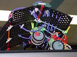 An image of a K*bot arching into the air.