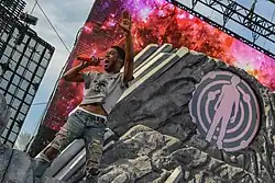 American rapper Kid Cudi performing live in 2014.