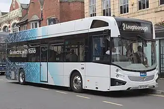 Photograph of white Volvo BZL single-decker demonstrator bus, with a destination display for Kinchbus's 2 route