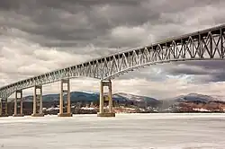 Kingston-Rhinecliff Bridge, river is iced over and snow is on the far shore