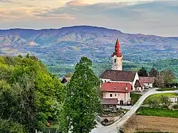 Koglo with St. Leonard's Church