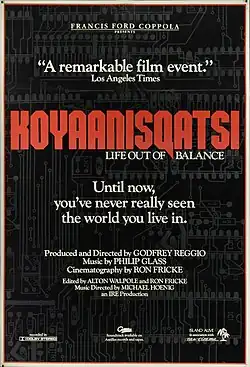 A black film poster with a dark gray background pattern resembling a circuit board. "KOYAANISQATSI" appears in large red text, with "LIFE OUT OF BALANCE" beneath in small white text. The poster also includes the quote "Until now, you've never really seen the world you live in" and "A remarkable film event" in addition to filmmaker credits listed throughout.