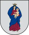 A coat of arms depicting a woman clothed in blue and brown wearing a golden crown and carrying a baby all on a grey background