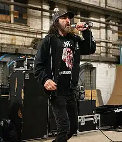 Brecht performing with D.R.I. in 2025