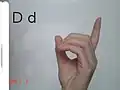 A formal ASL 'D', with the fingers rounded