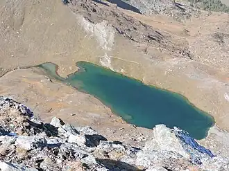 A body of water surrounded by land.