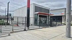 Photo of a glass panelled subway station entrance