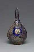 Bottle ca. 1300. Stonepaste with pigment and gilding over glaze. Yale University Art Gallery