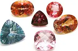 Facet cut topaz gemstones in various colors